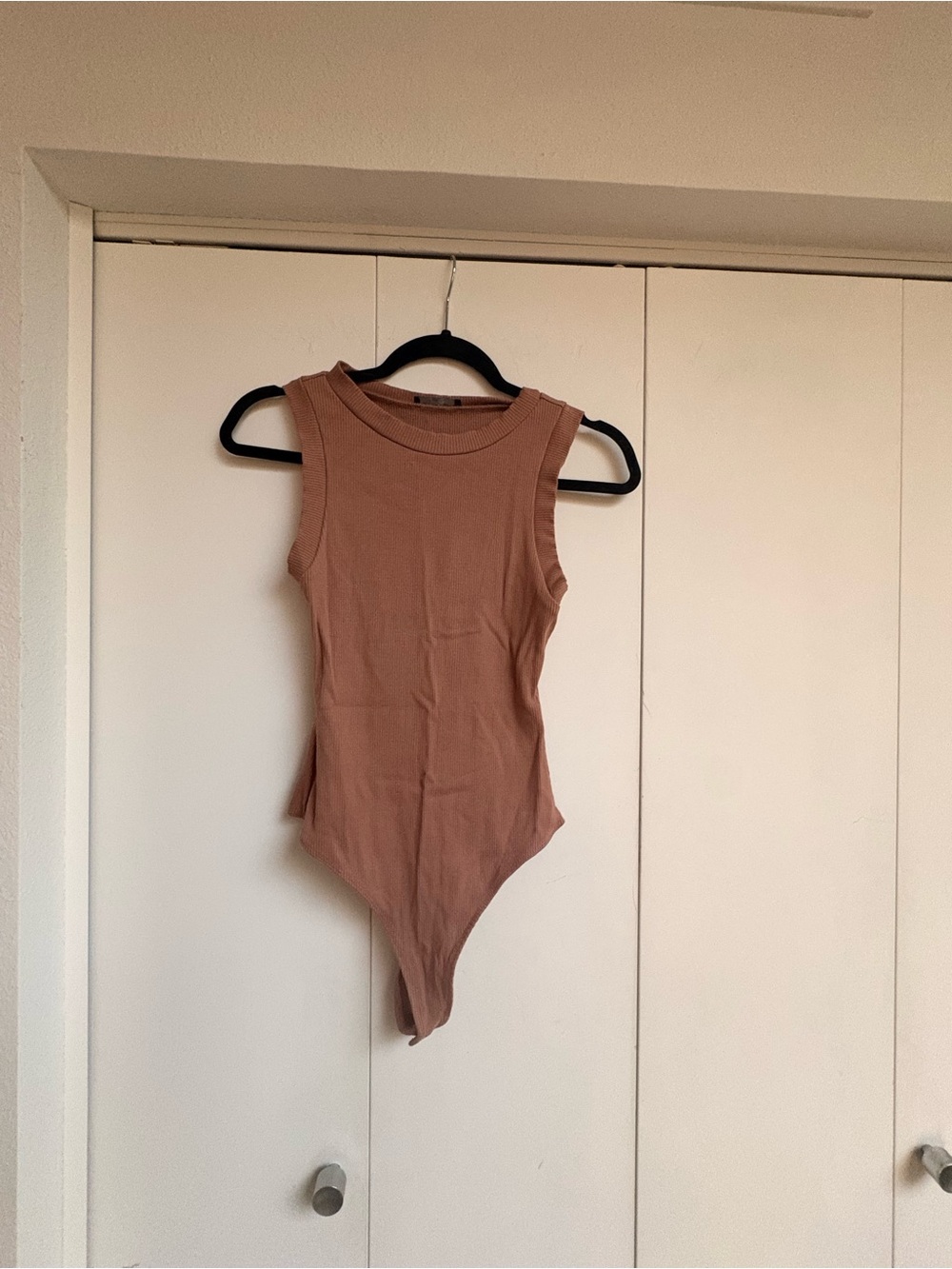 Naked Wardrobe One-Piece Bodysuit
